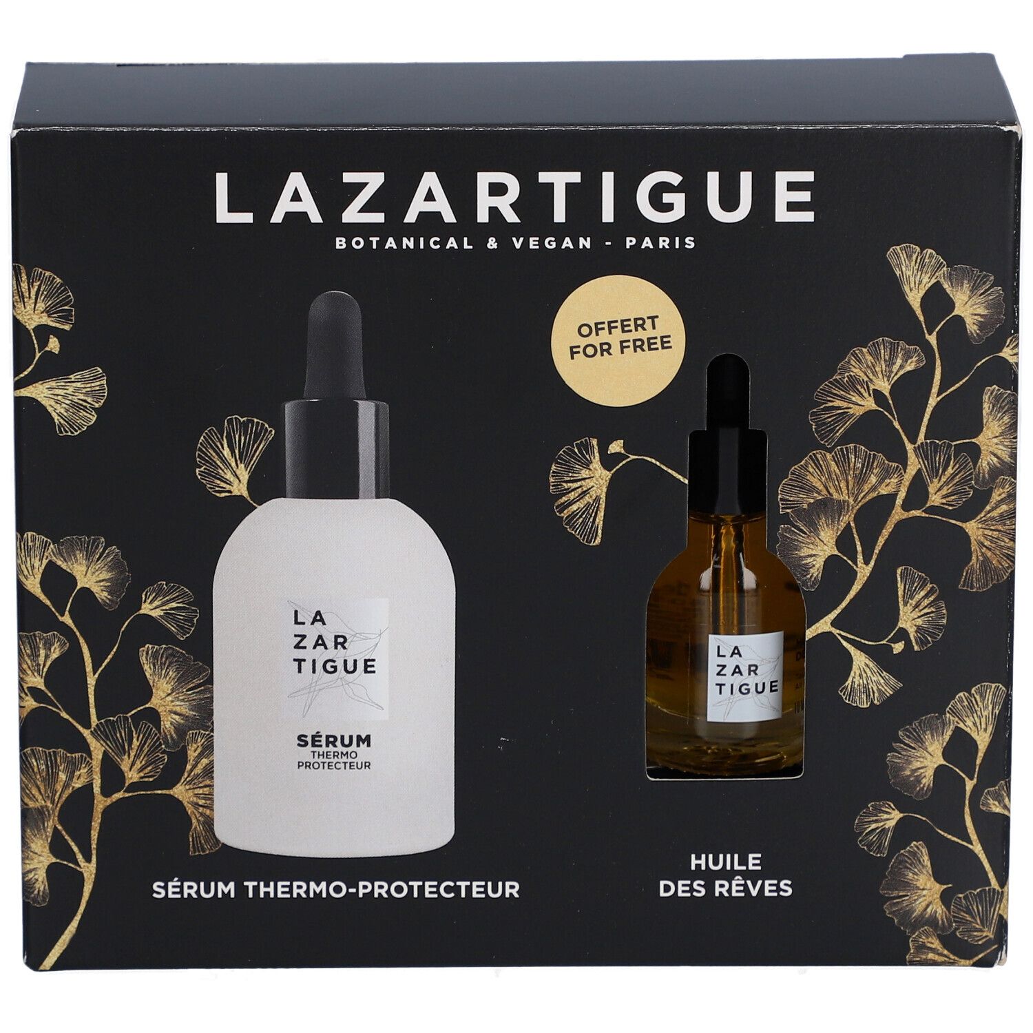 Coffret noir avec deux flacons. Inscription LAZARTIGUE. Un flacon blanc, un marron. Texte: SÉRUM THERMO-PROTECTEUR, HUILE DES RÊVES. Offert pour free.