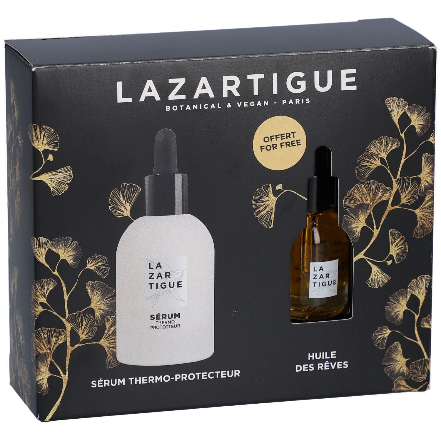 Coffret noir avec deux flacons. Inscription LAZARTIGUE. Un flacon blanc, un marron. Texte: SÉRUM THERMO-PROTECTEUR, HUILE DES RÊVES. Offert pour free.