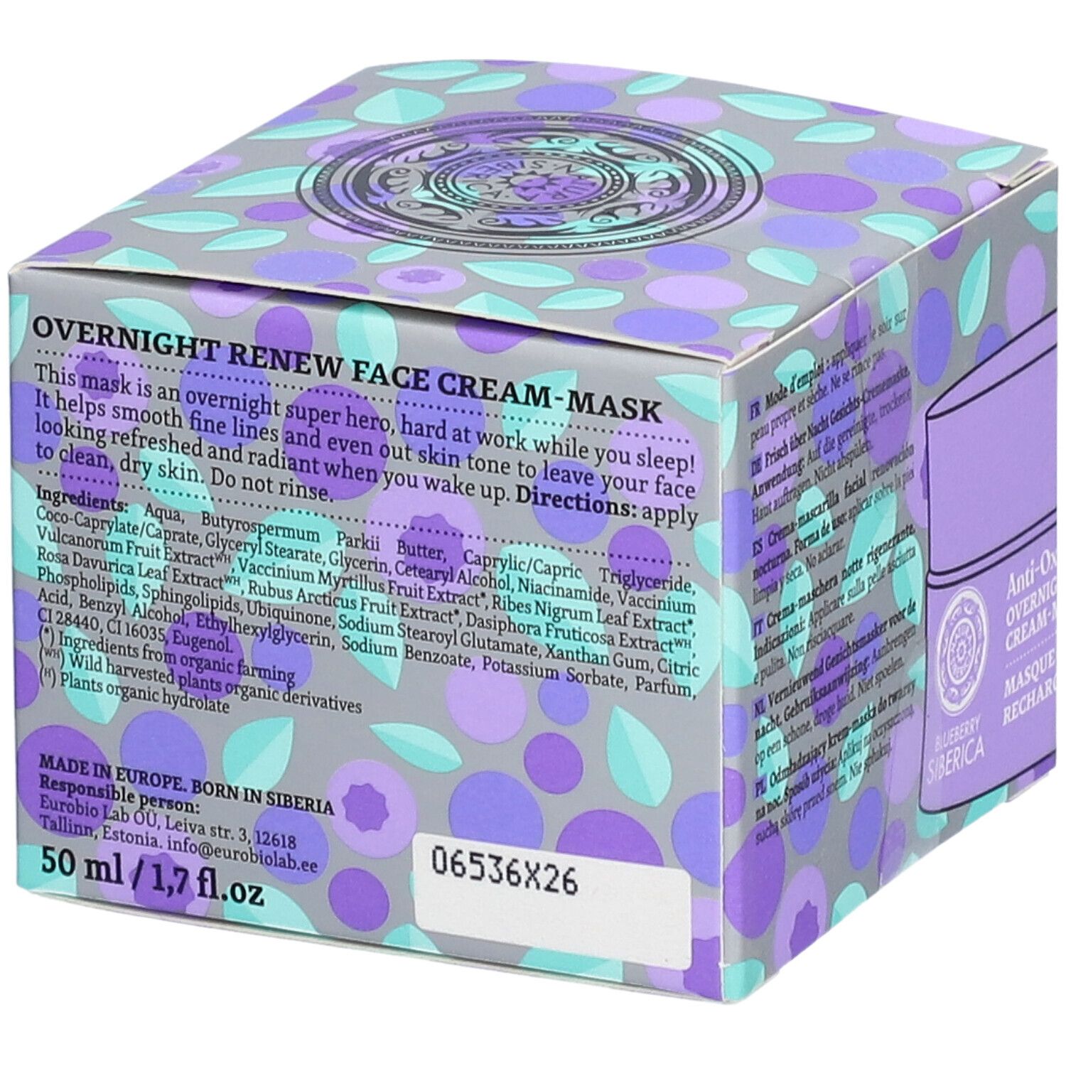 Verpakking met productinformatie. Tekst: Overnight Renew Face Cream-Mask. Blauwe, paarse en grijze kleuren. Blueberry Siberica.