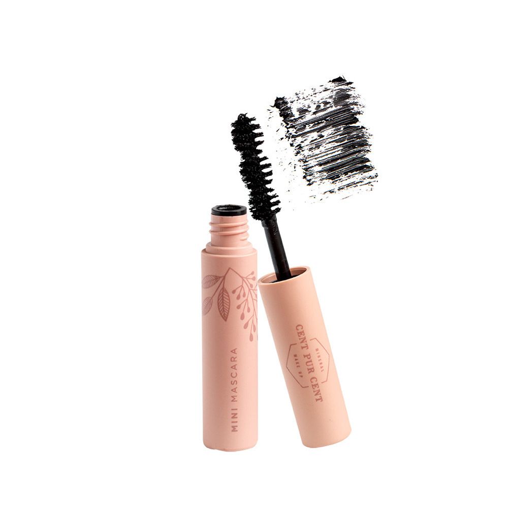 Mini-mascara noir, brosse et tube de mascara. Tube rose avec texte.