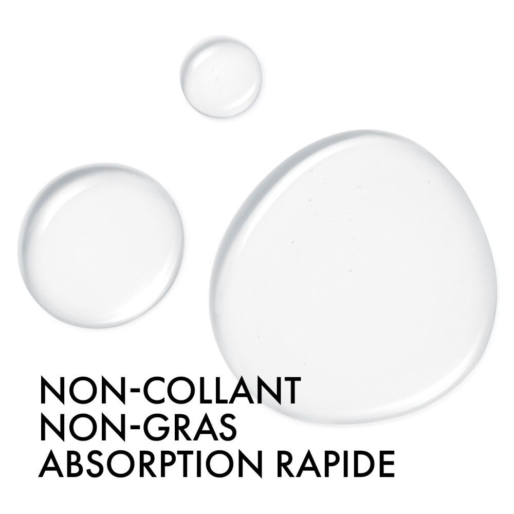 Gros plan sur des gouttes d'eau. Texte: Non collant, non gras, absorption rapide.