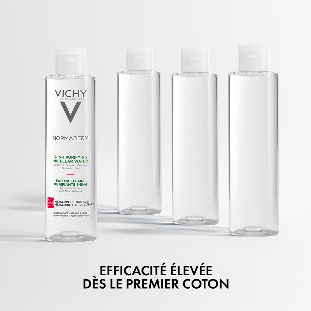 Quatre flacons d'Eau Micellaire Vichy Normaderm. Bouchon blanc. Texte: Vichy, Normaderm, 3-en-1 Eau Micellaire.