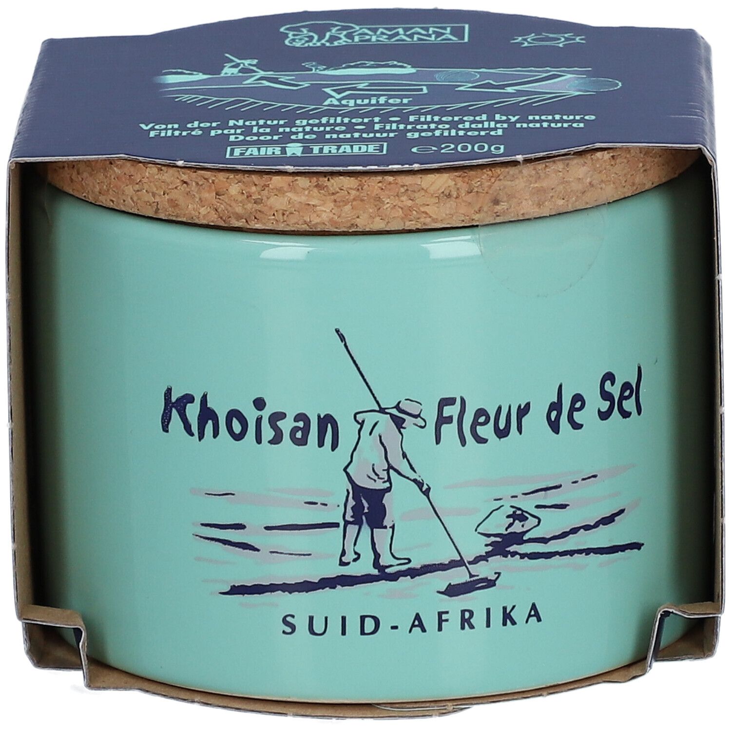 Pot en céramique turquoise avec couvercle en liège et emballage en papier. Inscription : Khoisan Fleur de Sel, SUID-AFRIKA. Illustration d'une personne.