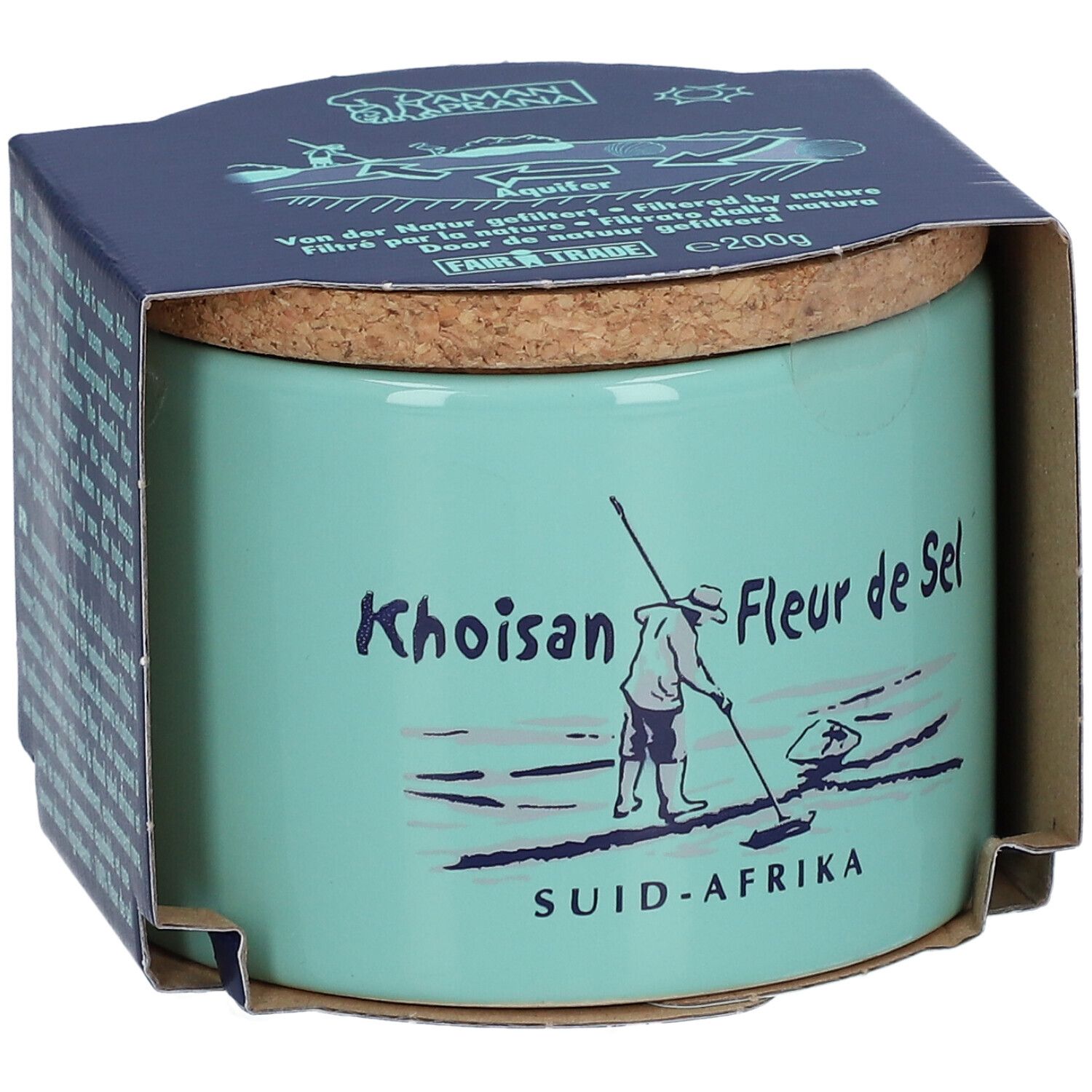 Pot en céramique turquoise avec couvercle en liège et emballage en papier. Inscription : Khoisan Fleur de Sel, SUID-AFRIKA. Illustration d'une personne.