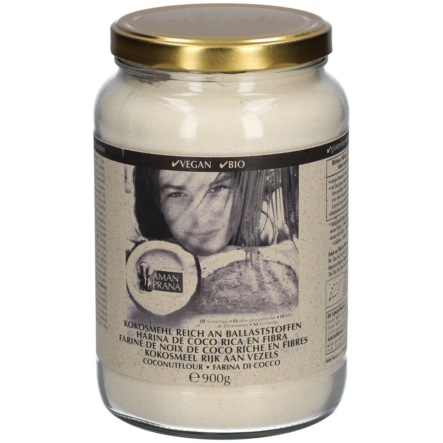 Pot de farine de coco. Couvercle doré. Inscription : Farine de noix de coco riche en fibres. Labels Vegan et Bio.