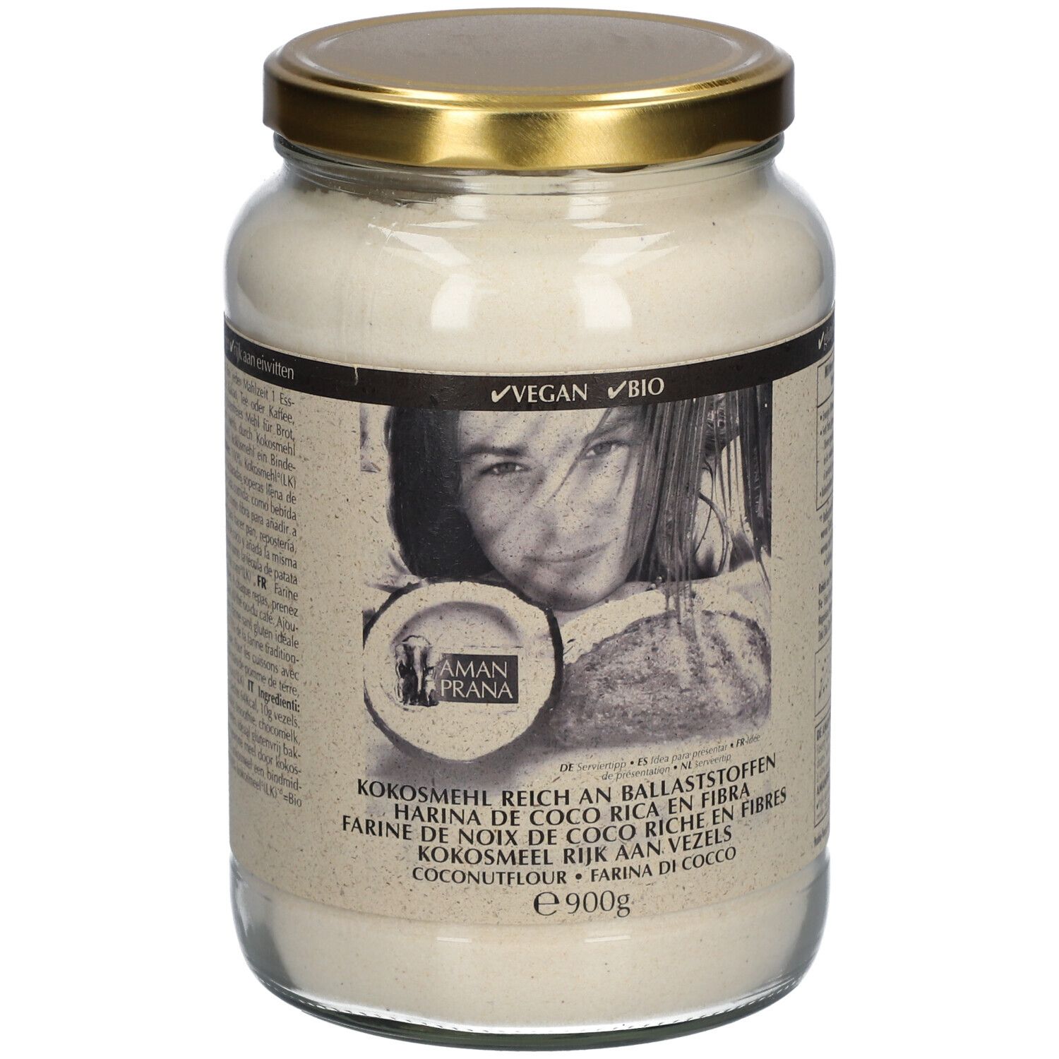 Pot de farine de coco. Couvercle doré. Inscription : Farine de noix de coco riche en fibres. Labels Vegan et Bio.