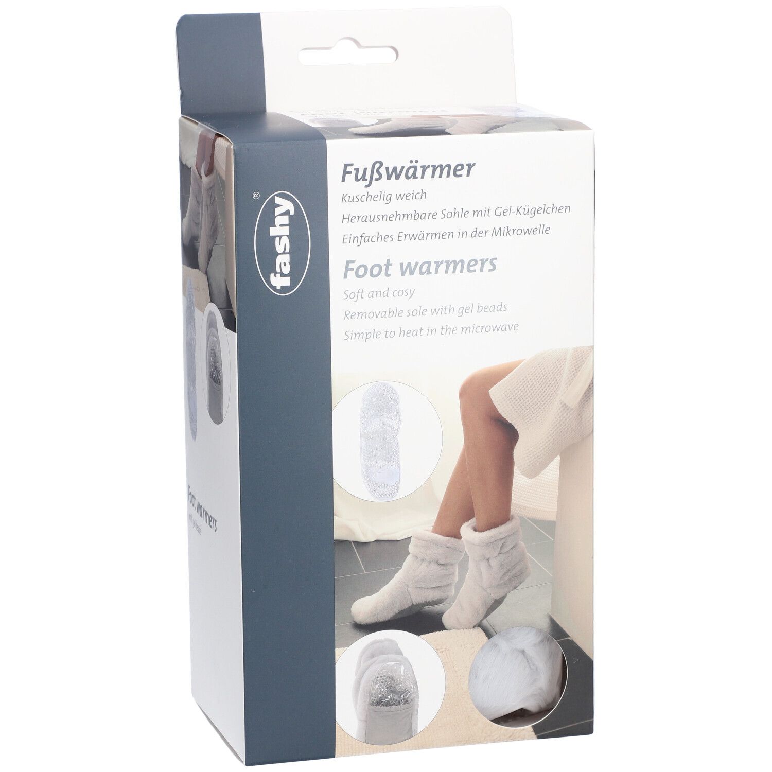 Fashy Fußwärmer-Verpackung. Seitenansicht. Text: Fußwärmer, herausnehmbare Sohle mit Gel-Kügelchen. Abbildung: Füße in Stiefeln.