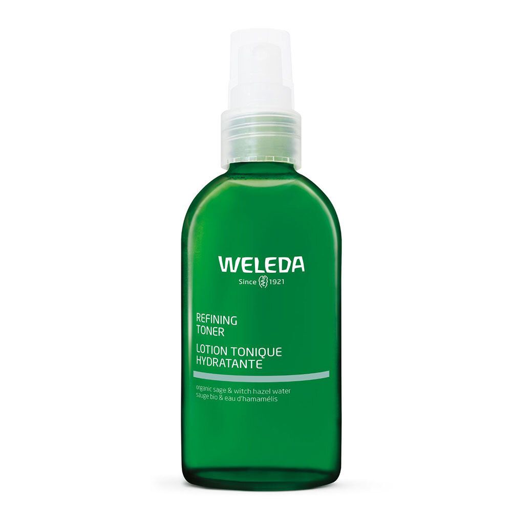 Flacon vert avec vaporisateur. Inscriptions: WELEDA, REFINING TONER, LOTION TONIQUE HYDRATANTE. Ingrédients: Sauge, eau d'hamamélis.