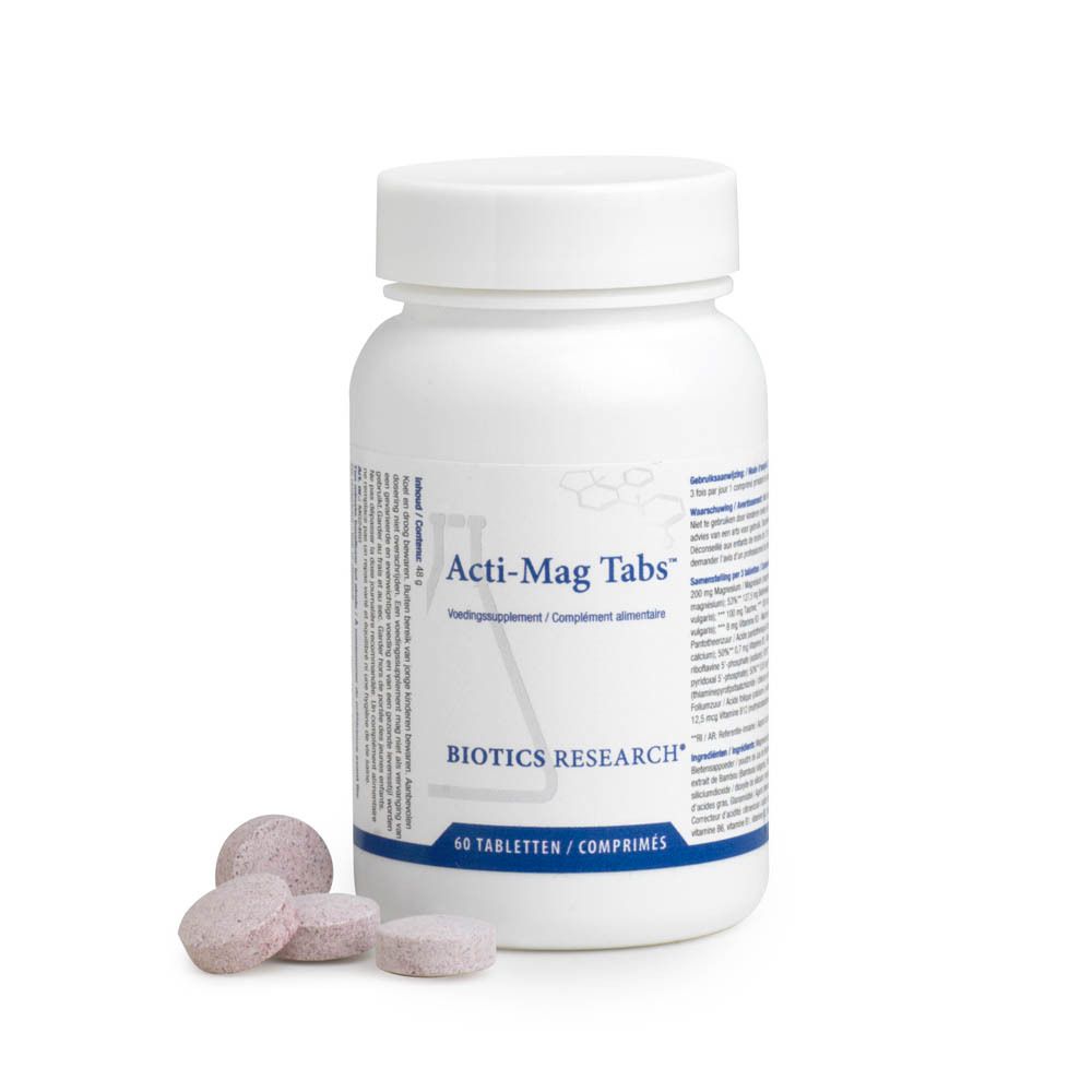 Flacon de comprimés blancs Acti-Mag Tabs. 60 comprimés. 3 comprimés à côté.