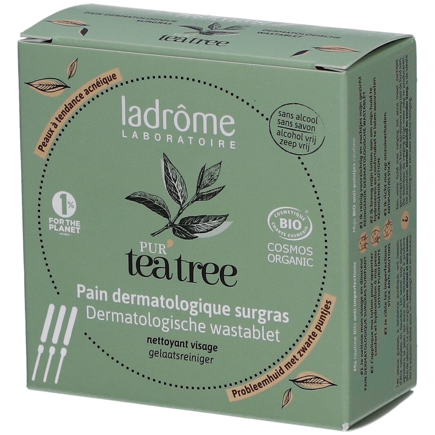 Boîte verte avec logo et nom du produit. Texte : Pur Tea Tree, Pain Dermatologique surgras, Dermatologische wastablet.