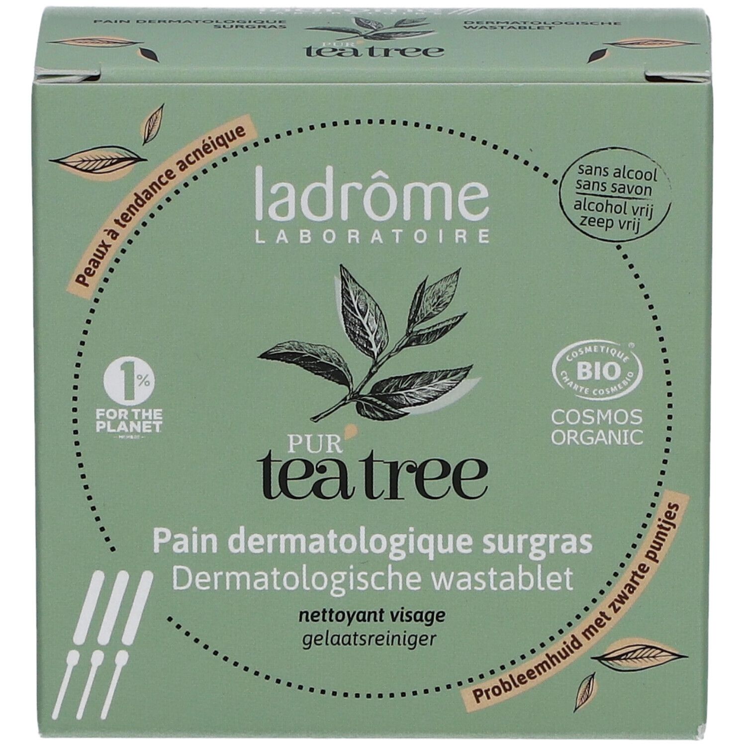 Boîte verte avec logo et nom du produit. Texte : Pur Tea Tree, Pain Dermatologique surgras, Dermatologische wastablet.