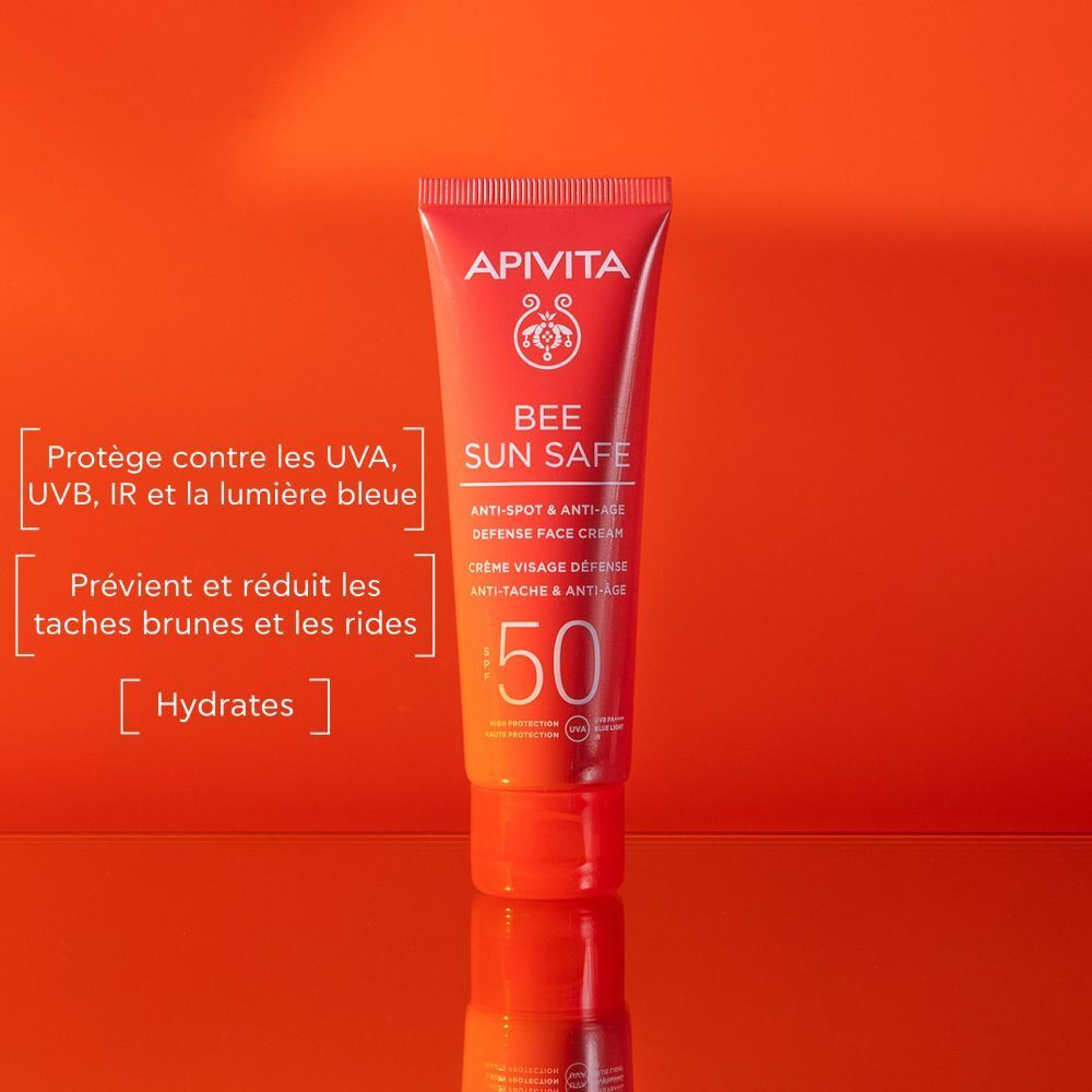Tube rouge sur fond orange. Nom du produit: Apivita Bee Sun Safe. SPF 50.
