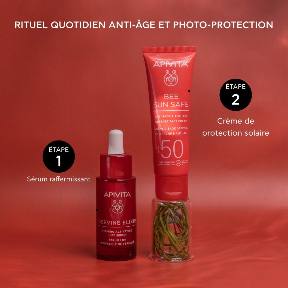 Routine anti-âge quotidienne. Produits Apivita: sérum et crème solaire.