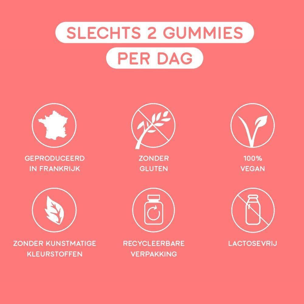 Fles gummies. Opschrift: Good Hair, Vitamines Boost. Roze etiket. Tekst en sterren.