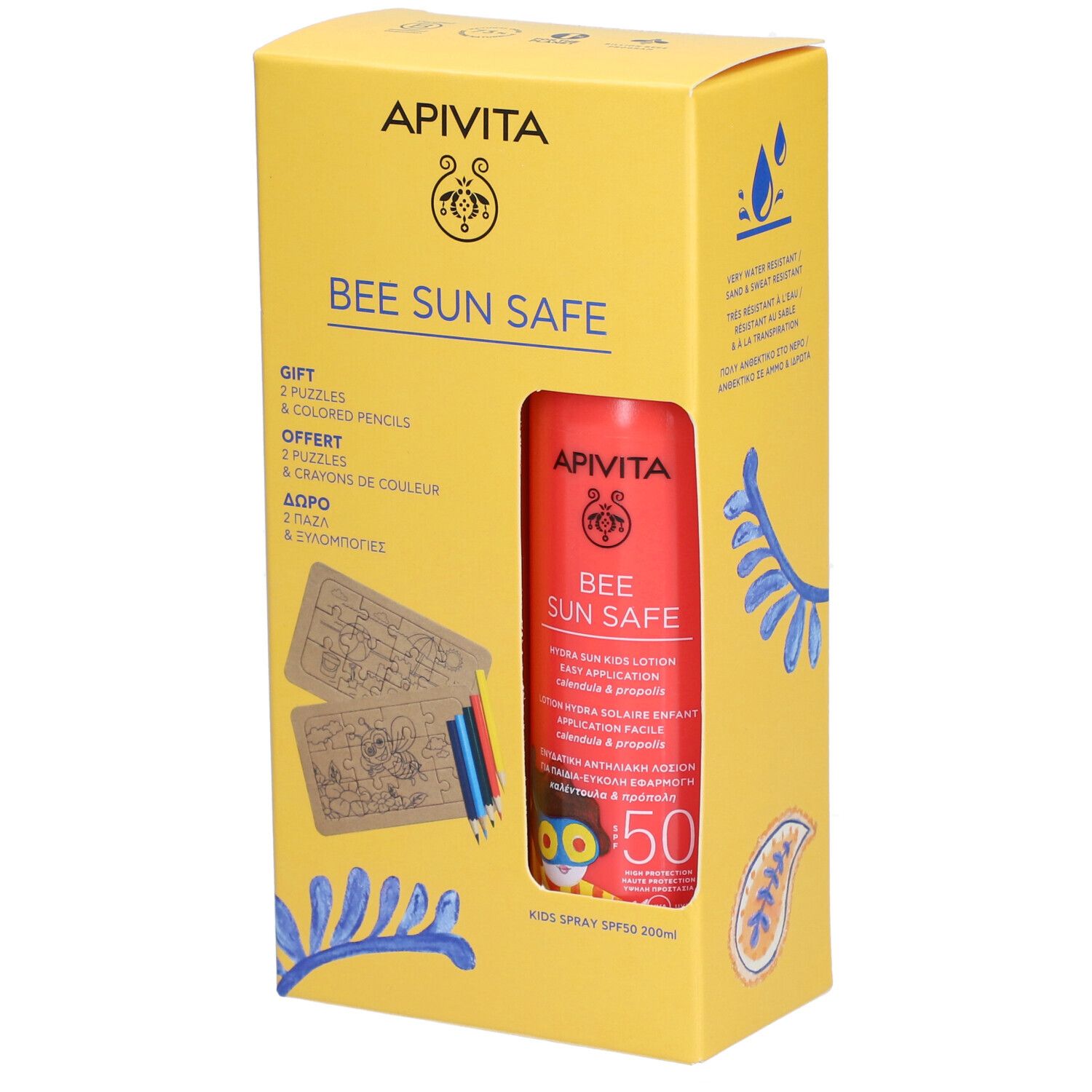 Gelbe Geschenkbox mit roter Sonnencreme, Puzzles und Buntstiften. Aufschrift: Bee Sun Safe SPF50.