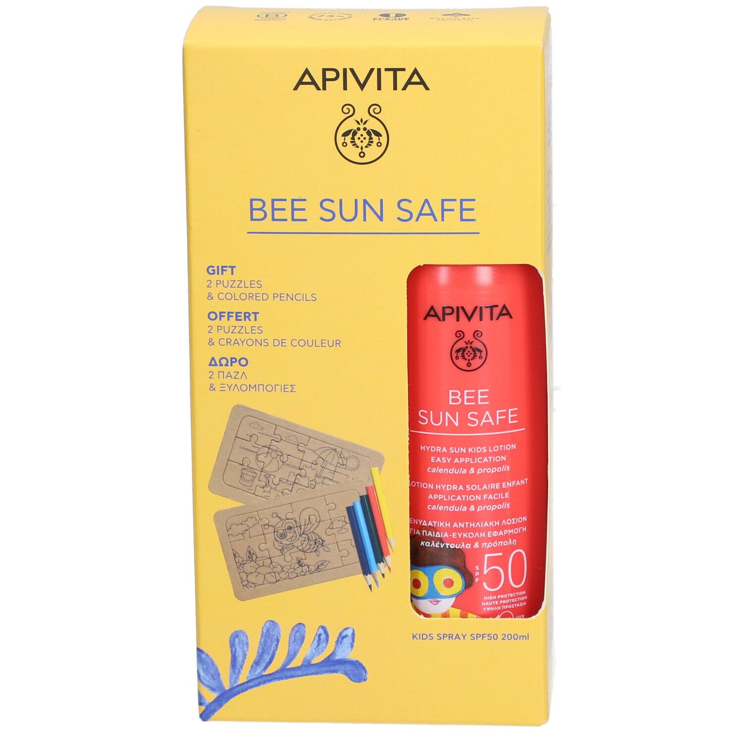 Gelbe Geschenkbox mit roter Sonnencreme, Puzzles und Buntstiften. Aufschrift: Bee Sun Safe SPF50.