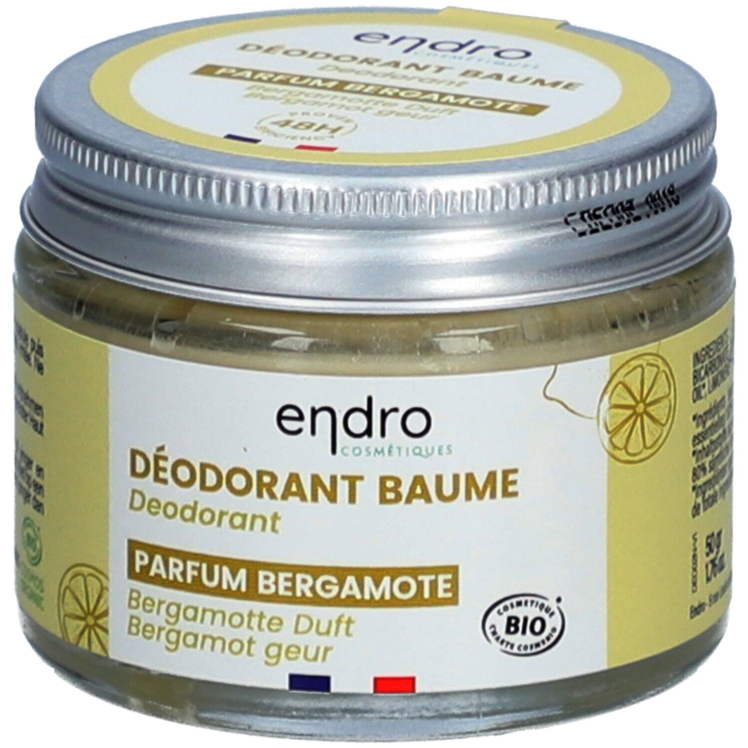 Baume déodorant en pot avec couvercle vissé. Inscription Parfum Bergamote, certification Bio.