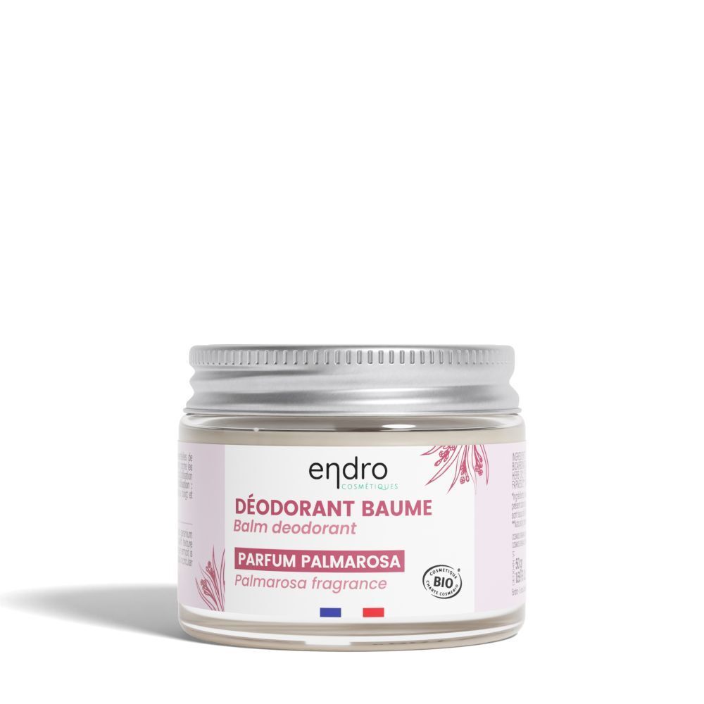Pot de déodorant Baume Endro, parfum Palmarosa. Couvercle argenté, étiquette rose avec informations et label bio.