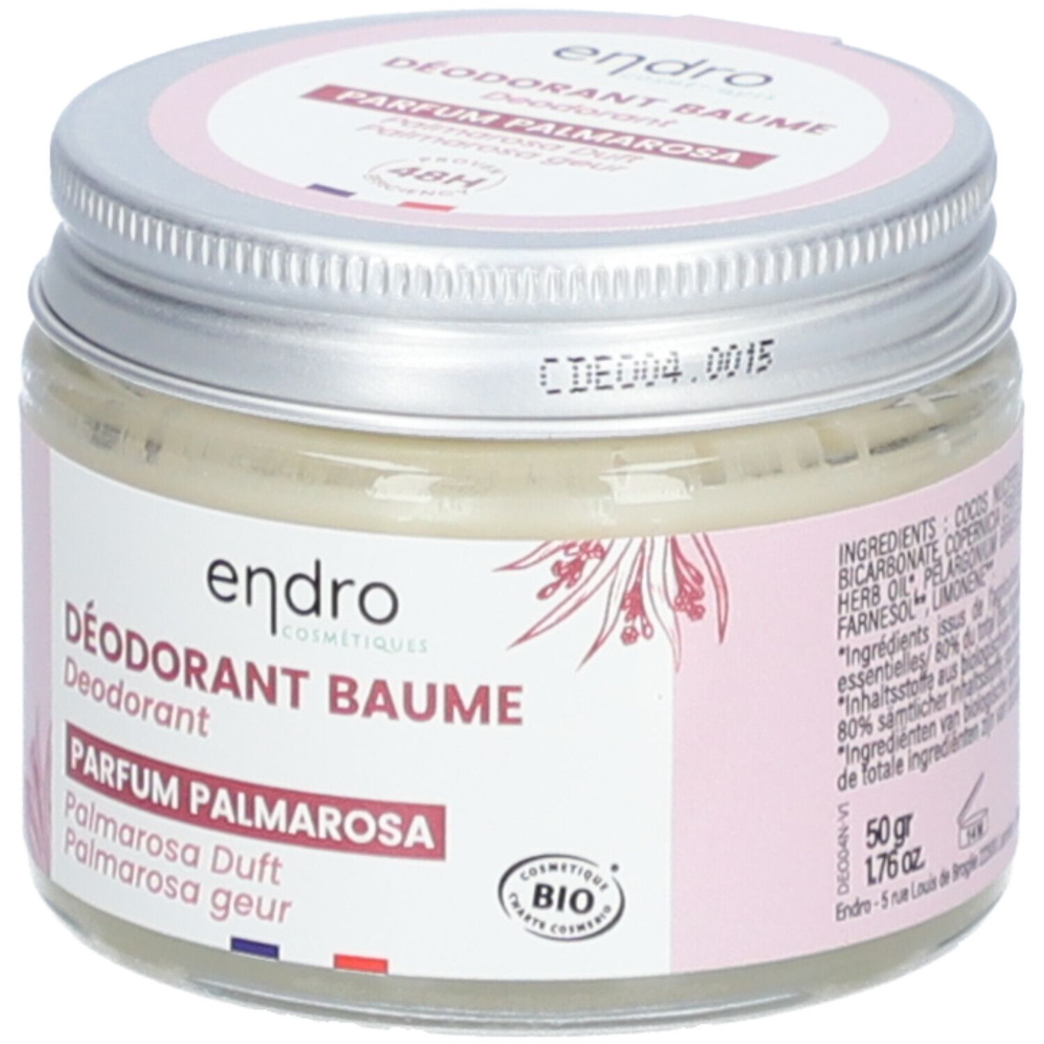 Pot de déodorant Baume Endro, parfum Palmarosa. Couvercle argenté, étiquette rose avec informations et label bio.