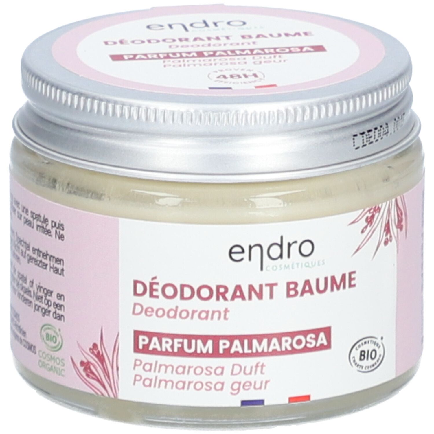 Pot de déodorant Baume Endro, parfum Palmarosa. Couvercle argenté, étiquette rose avec informations et label bio.