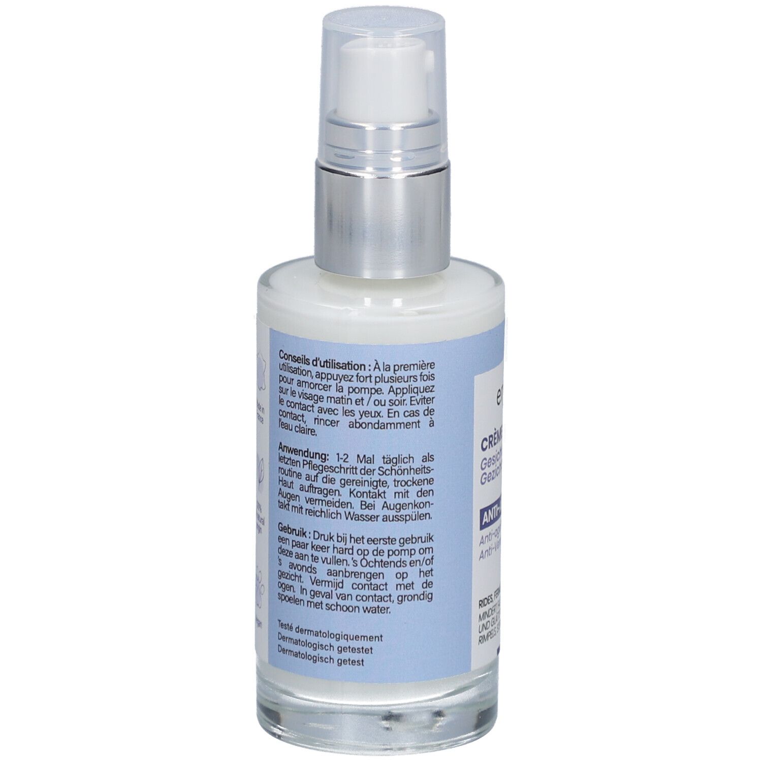 Vue arrière de la crème visage. Étiquettes bleues avec instructions d'utilisation en allemand, français et néerlandais.