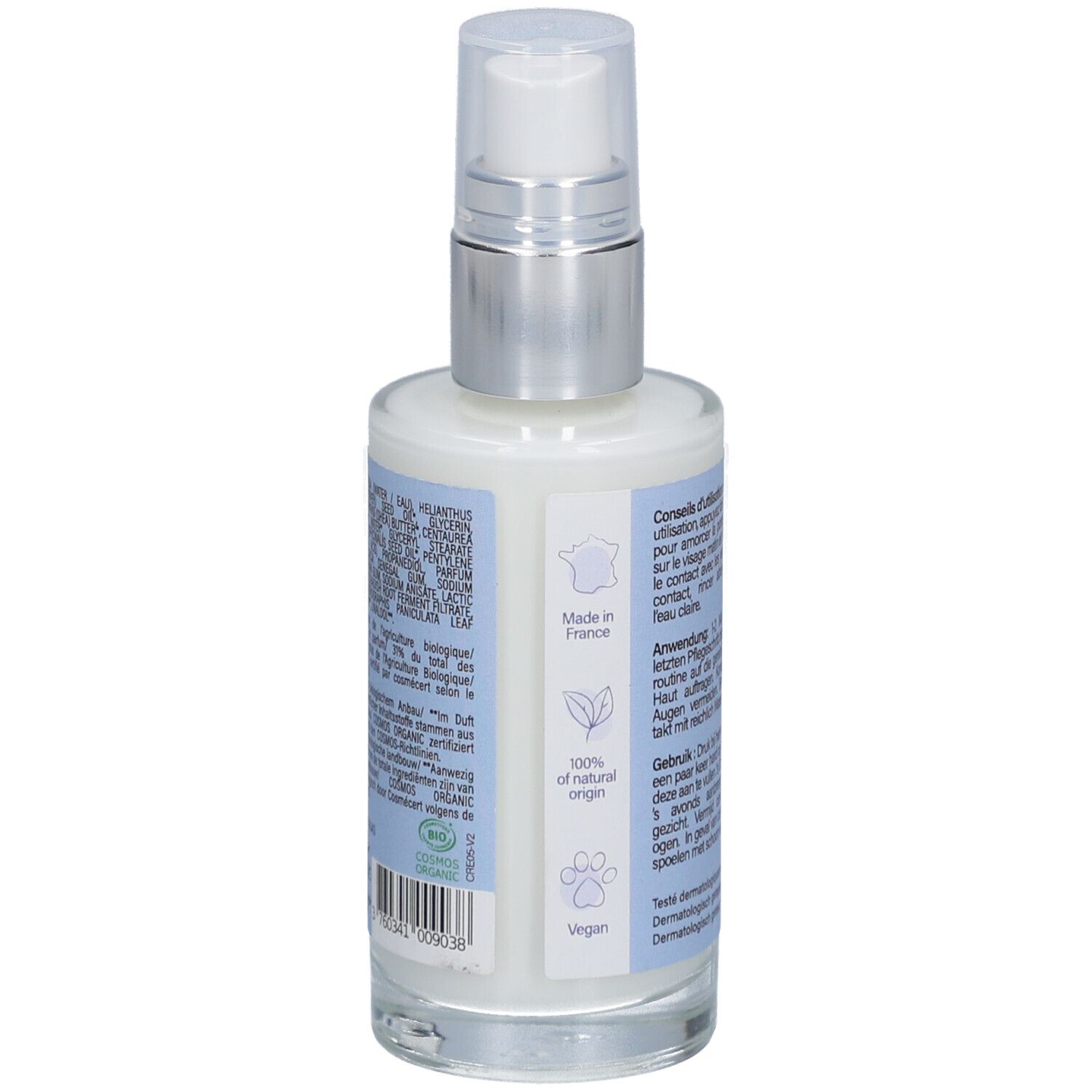 Vue arrière de la crème visage. Étiquettes bleues avec ingrédients, origine, labels vegan et bio.