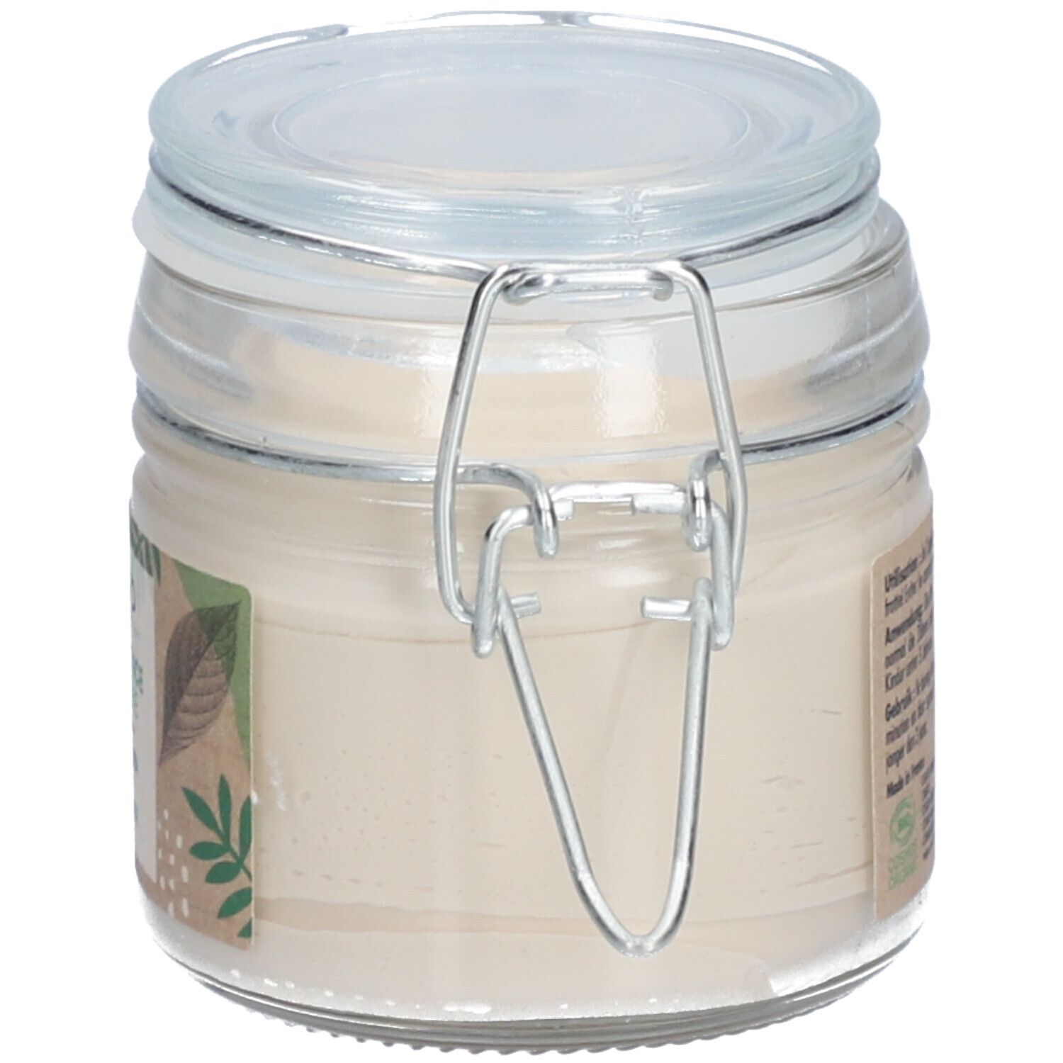Glazen pot met tandpasta. Label met tekst en barcode. Bio-certificering. Deksel met metalen sluiting.