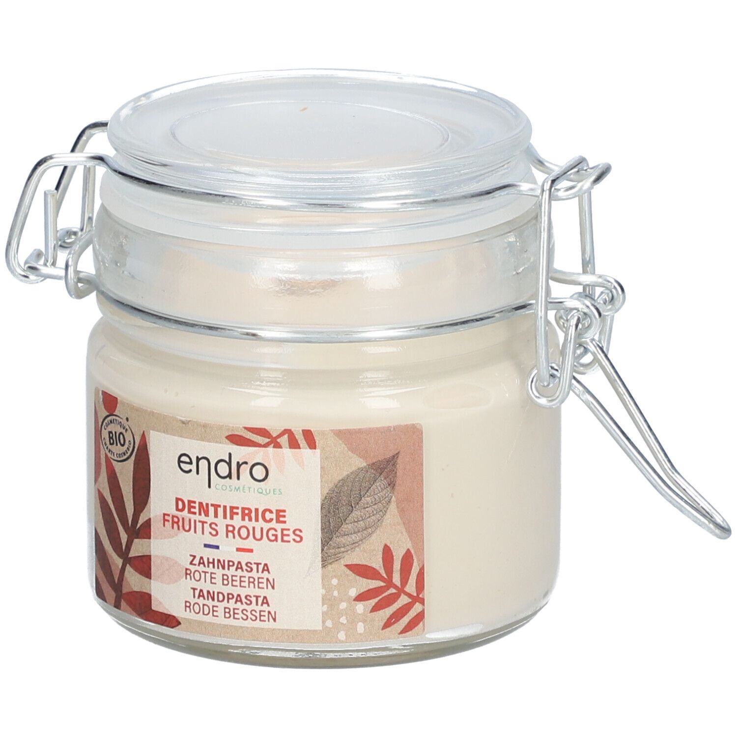 Glas mit Bügelverschluss, gefüllt mit weißer Zahnpasta. Etikett mit "endro", "BIO", "Zahncreme Rote Beeren".