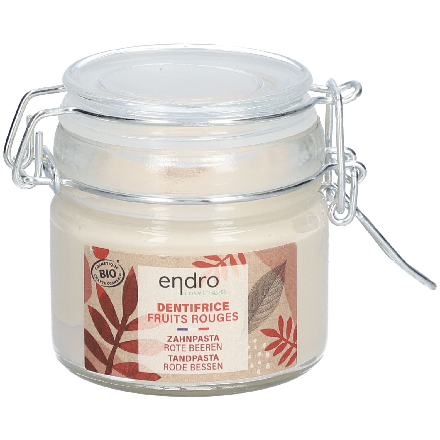 Endro Zahncreme in roter Beerengeschmack in einem Glasbehälter mit Bügelverschluss.