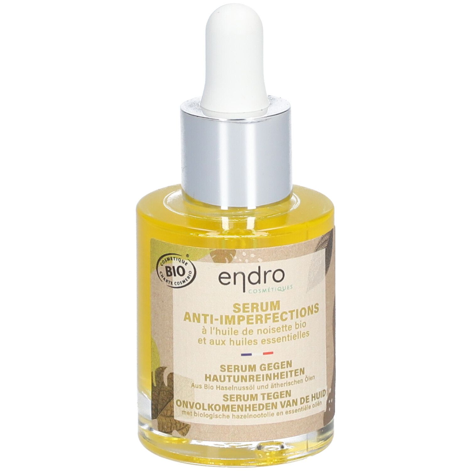 Serumflasche mit Pipette. Aufschrift: Endro, Anti-Imperfektionen. Bio-Siegel. Gelbe Flüssigkeit sichtbar.