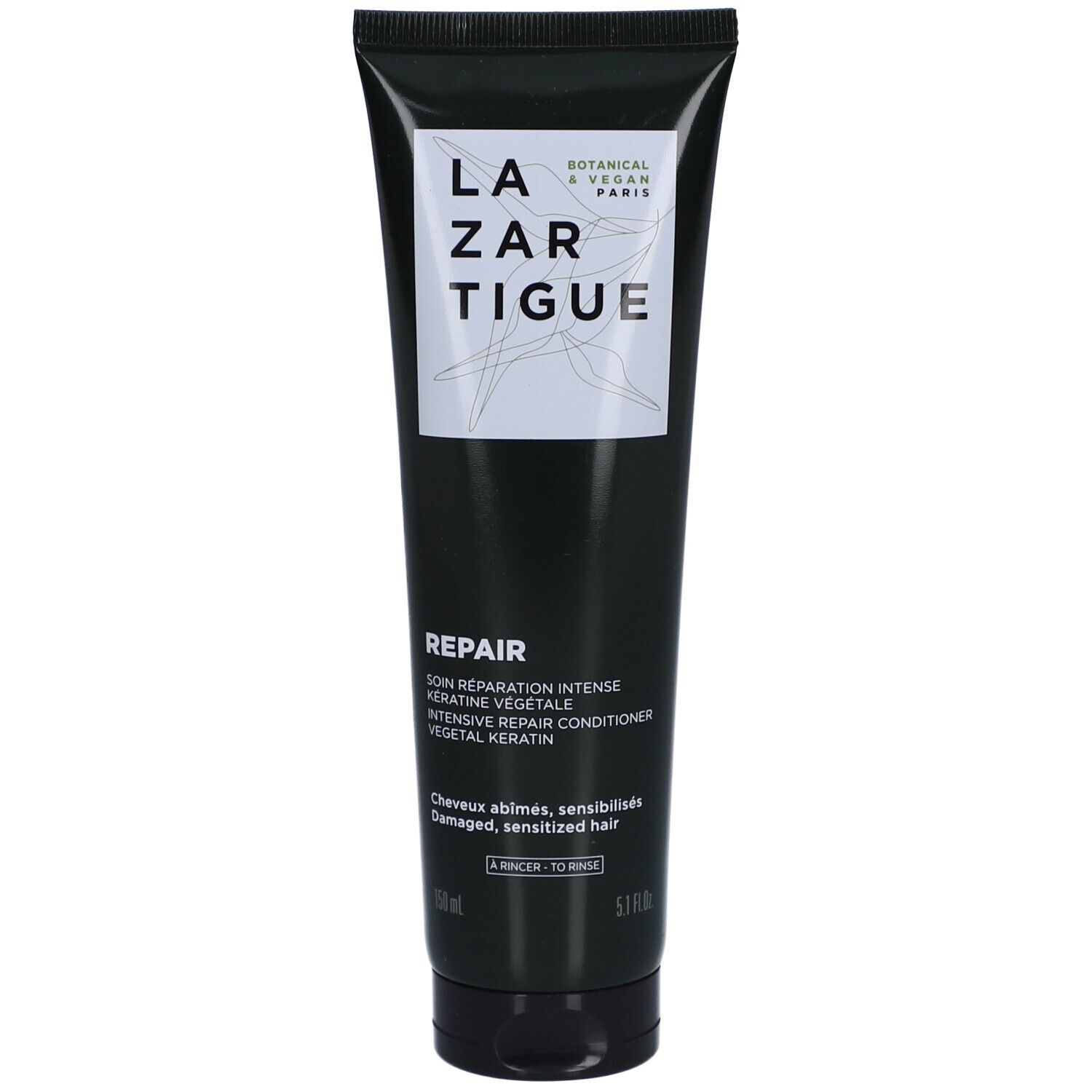 Tube noir avec étiquette blanche. Inscription: LAZARTIGUE, REPAIR, kératine. Pour cheveux abîmés. Bouchon noir.