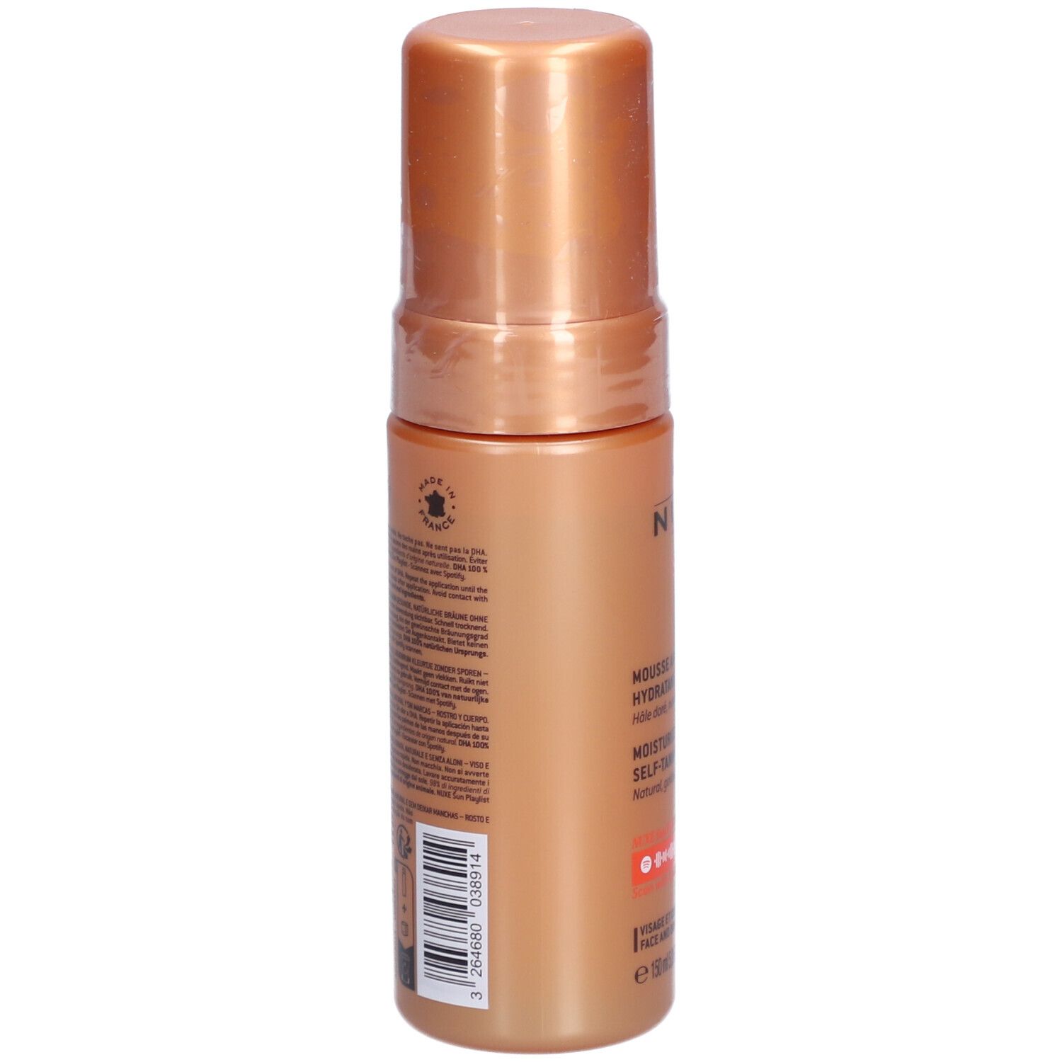 Achteraanzicht van de zelfbruinende mousse fles. Goudkleurige behuizing, goudkleurige dop. Tekst en barcode.