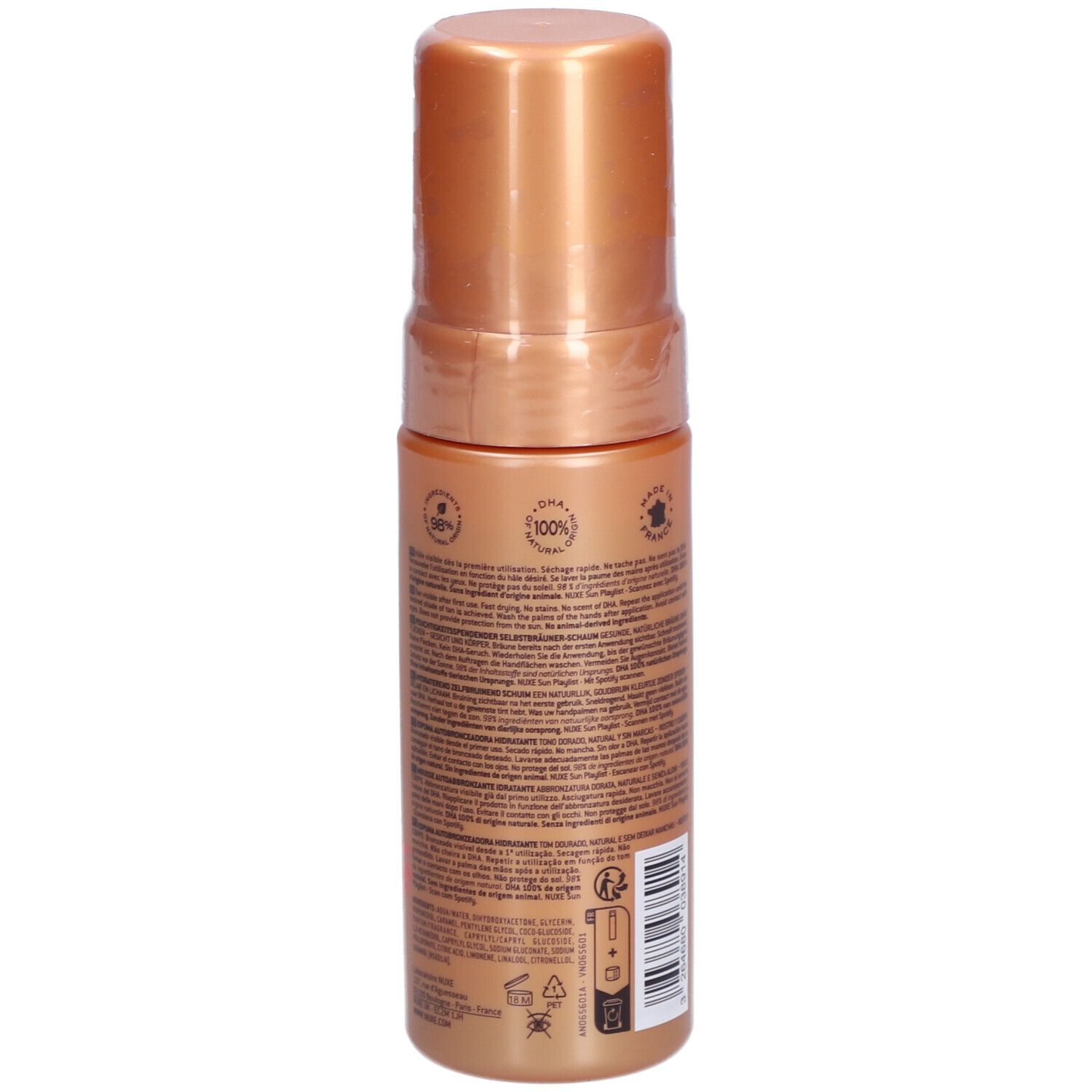 Achteraanzicht van de zelfbruinende mousse fles. Goudkleurige behuizing, goudkleurige dop. Tekst en logo's.