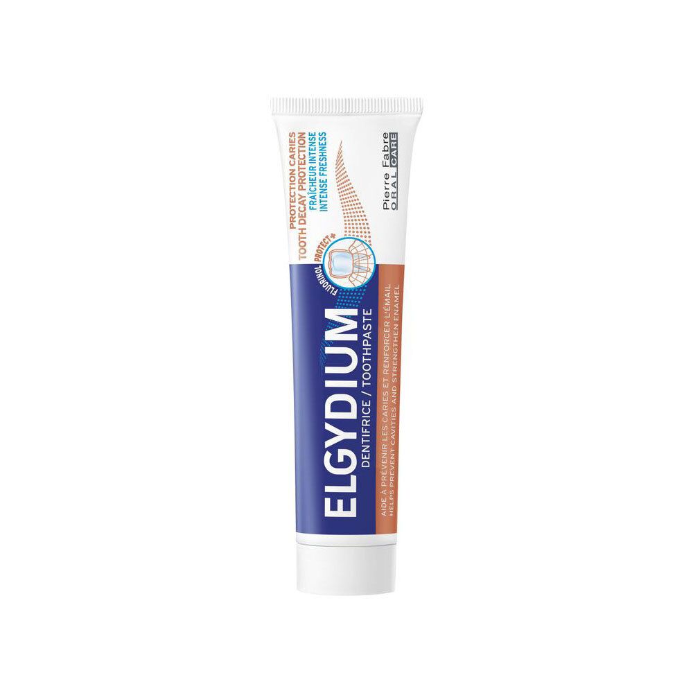 Tube de dentifrice ELGYDIUM. Inscription: 'Protection Caries, Fraîcheur Intense'. Logo et nom de la marque visibles.