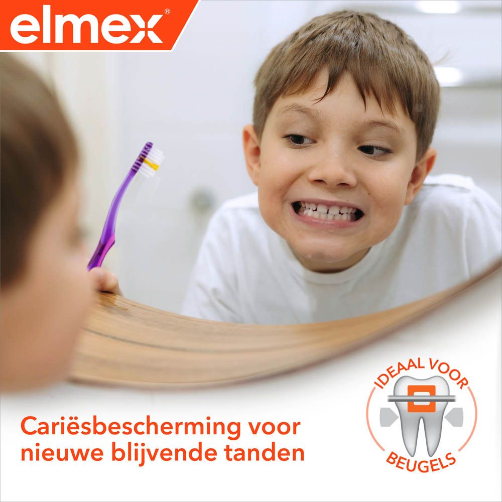 Tandenborstel met tandpasta op borstelharen. Elmex logo. Tekst: Milde kindvriendelijke smaak.