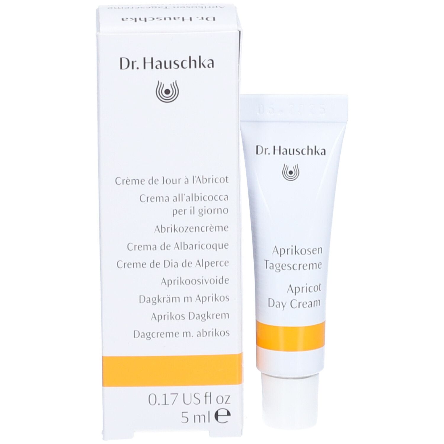 Produkt und Verpackung. Tube und Schachtel. Aufschrift: Dr. Hauschka, Aprikosen Tagescreme, Apricot Day Cream.