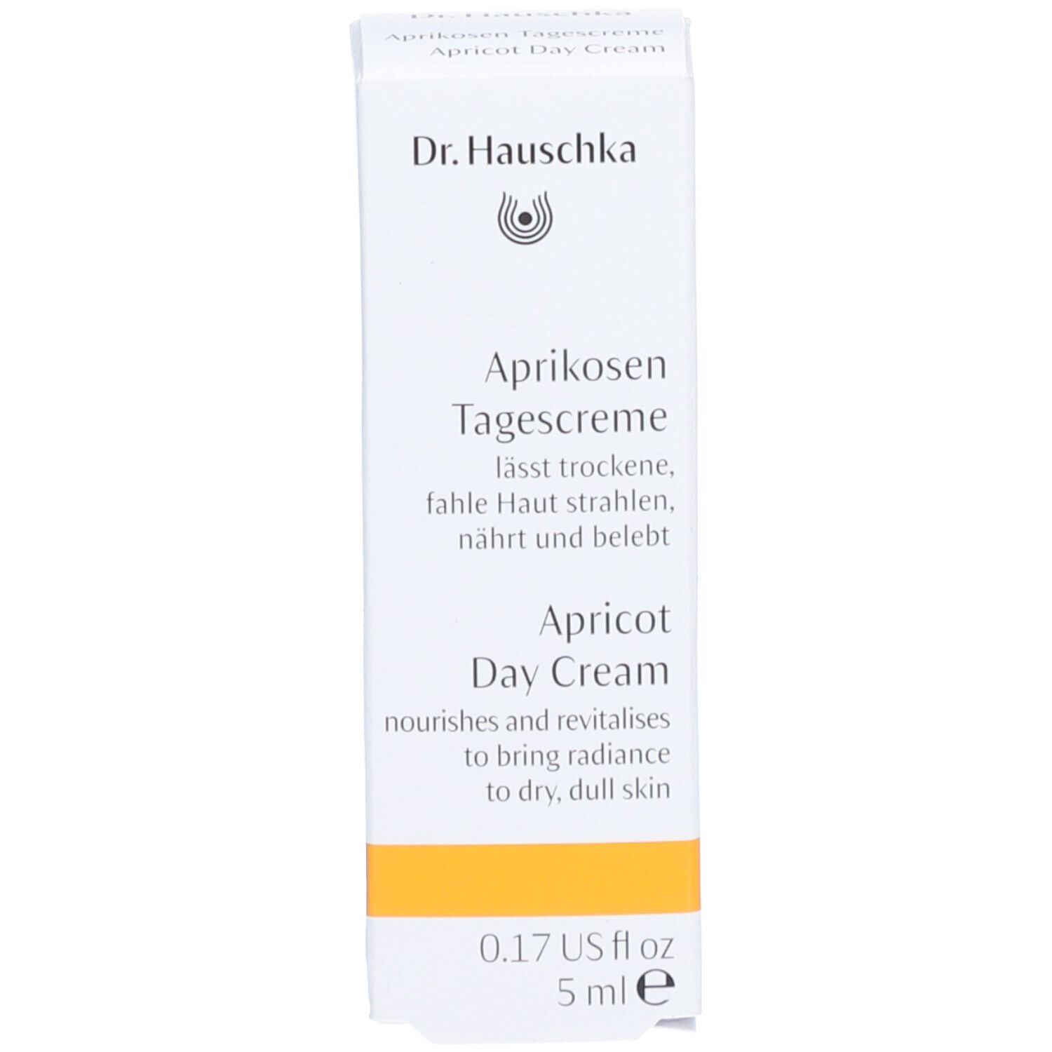 Vorderseite der Schachtel. Aufschrift: Dr. Hauschka, Aprikosen Tagescreme, 5 ml. Beschreibung der Wirkung.