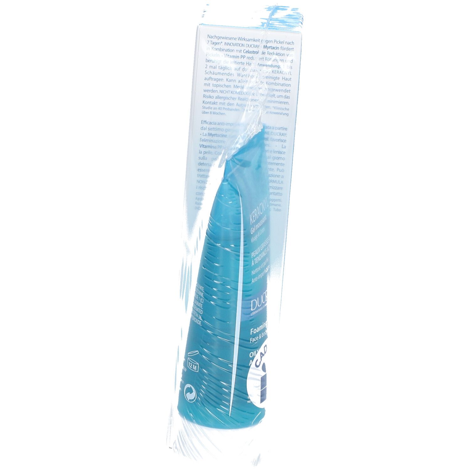Blauwe en witte tube in transparante verpakking. Op de tube staat "KERACNYL Gel moussant".