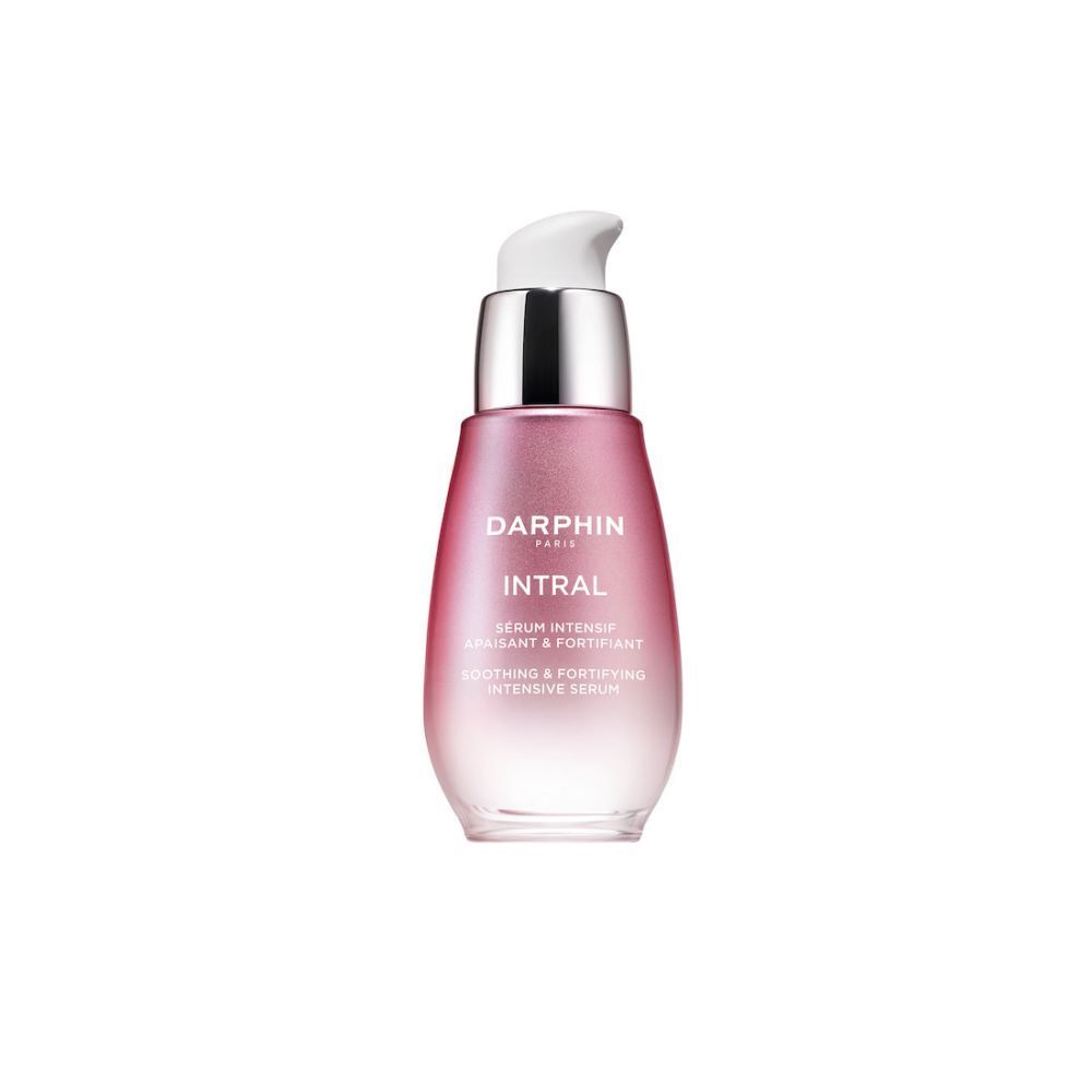 Flacon de sérum rose avec pompe argentée. Sérum Darphin Intral, texte.