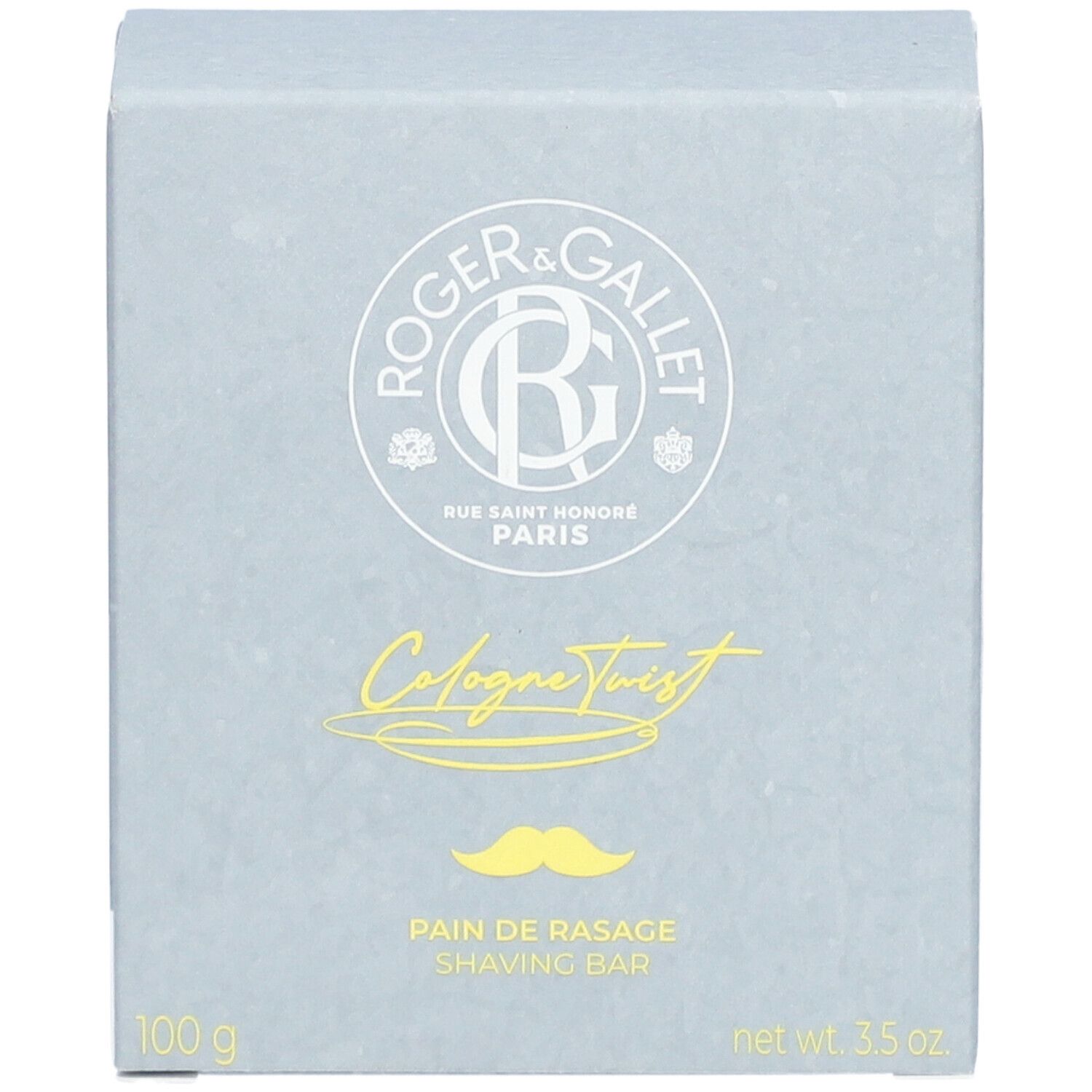 Boîte grise. Logo et texte. Texte: Cologne Twist, Pain de Rasage, 100 g, net wt. 3.5 oz.