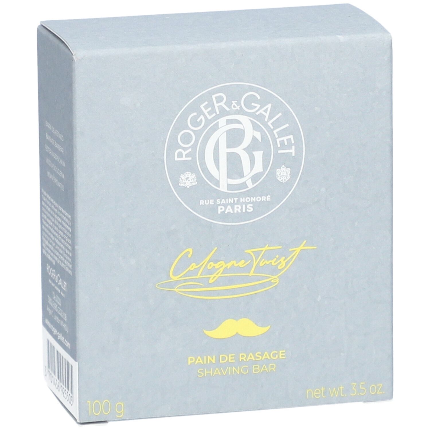 Boîte grise. Logo et texte. Texte: Cologne Twist, Pain de Rasage, 100 g, net wt. 3.5 oz.
