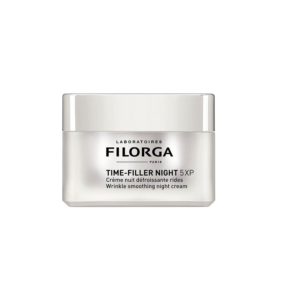 Filorga Time-Filler Night 5XP. Pot de crème. Couvercle blanc, pot transparent. Texte: crème, rides. Tous types de peau.