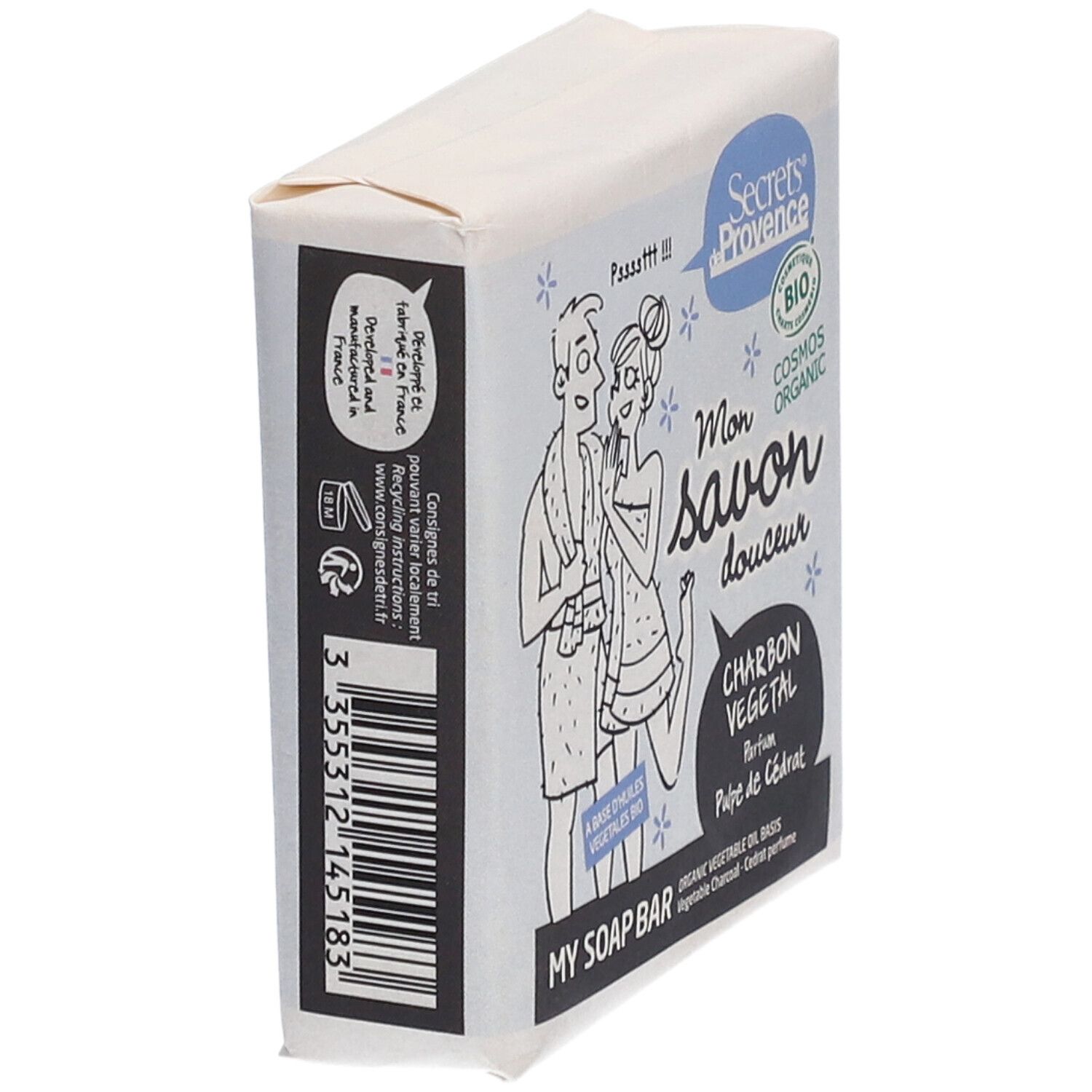 Savon emballé. Illustration d'un couple et texte: "Secrets de Provence", "Mon savon douceur", "Charbon Végétal". Label bio.