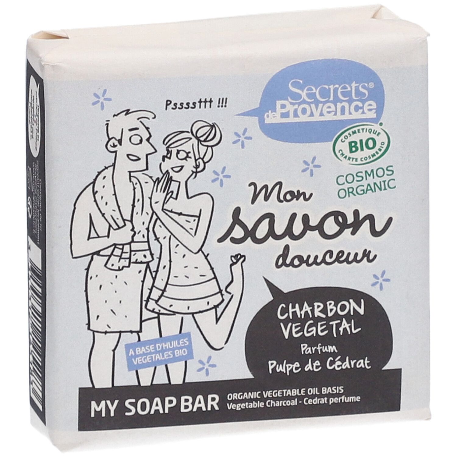 Savon emballé. Illustration d'un couple et texte: "Secrets de Provence", "Mon savon douceur", "Charbon Végétal". Label bio.