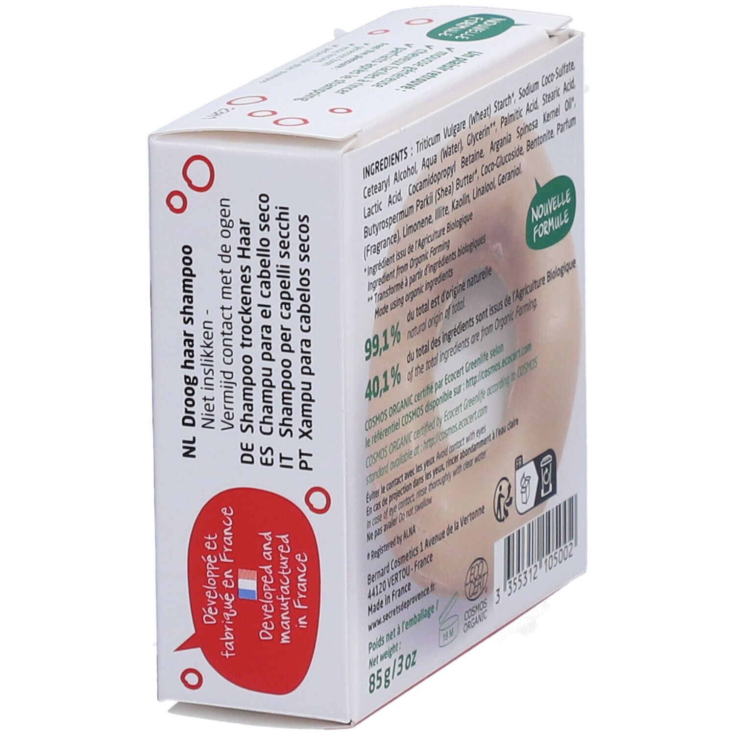 Emballage du produit en biais. Inscription: Shampooing pour cheveux secs. Adresse du fabricant, certification bio, poids: 85g/3oz.