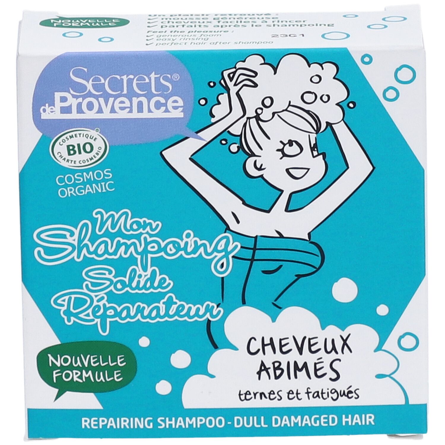 Boîte de shampooing solide. Inscription : "Secrets de Provence", "Mon Shampoing Solide Réparateur", "Cheveux Abîmés". Certification bio.