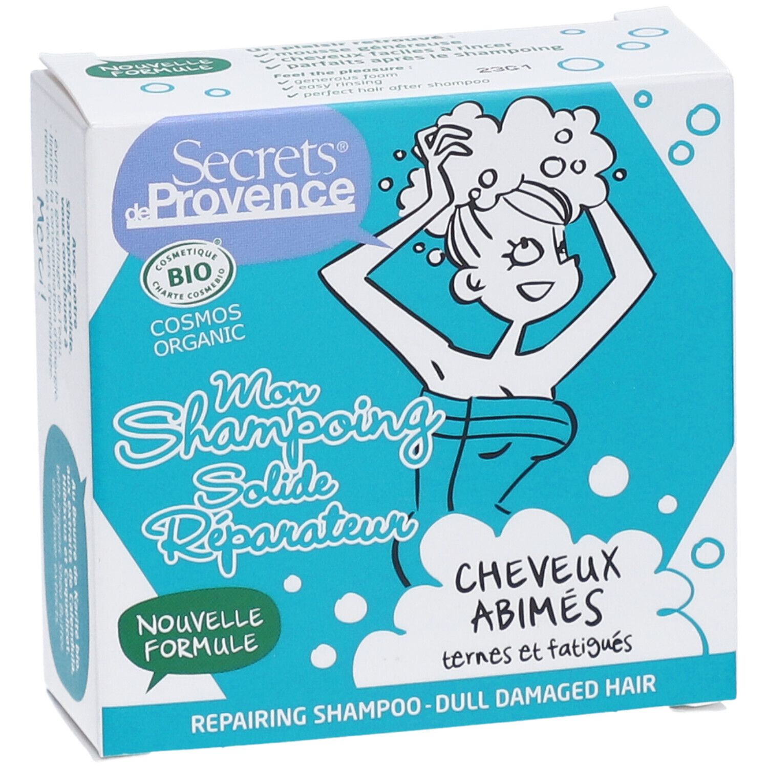 Boîte de shampooing solide. Inscription : "Secrets de Provence", "Mon Shampoing Solide Réparateur", "Cheveux Abîmés". Certification bio.
