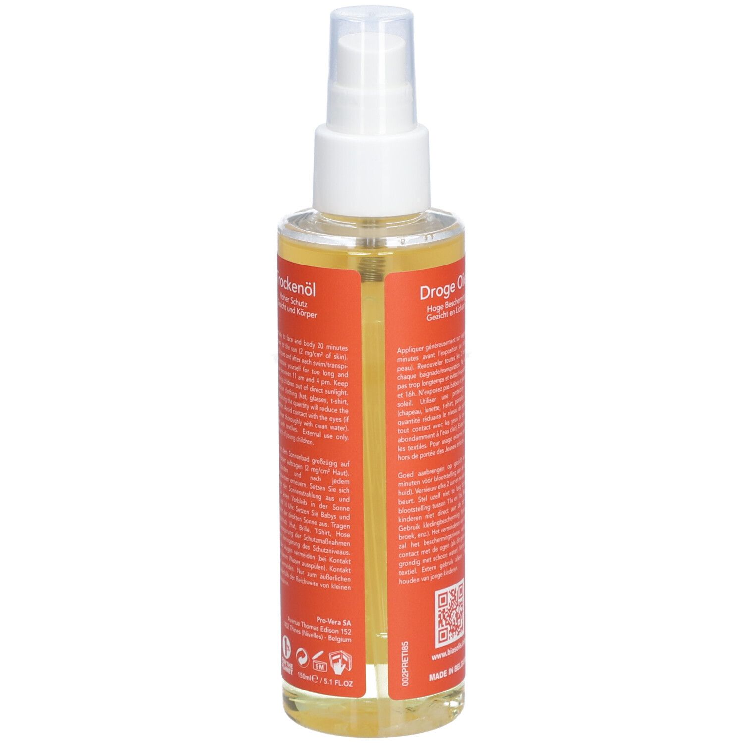 Flacon spray d'huile solaire. Vue arrière avec texte multilingue. Étiquette orange. Liquide transparent.