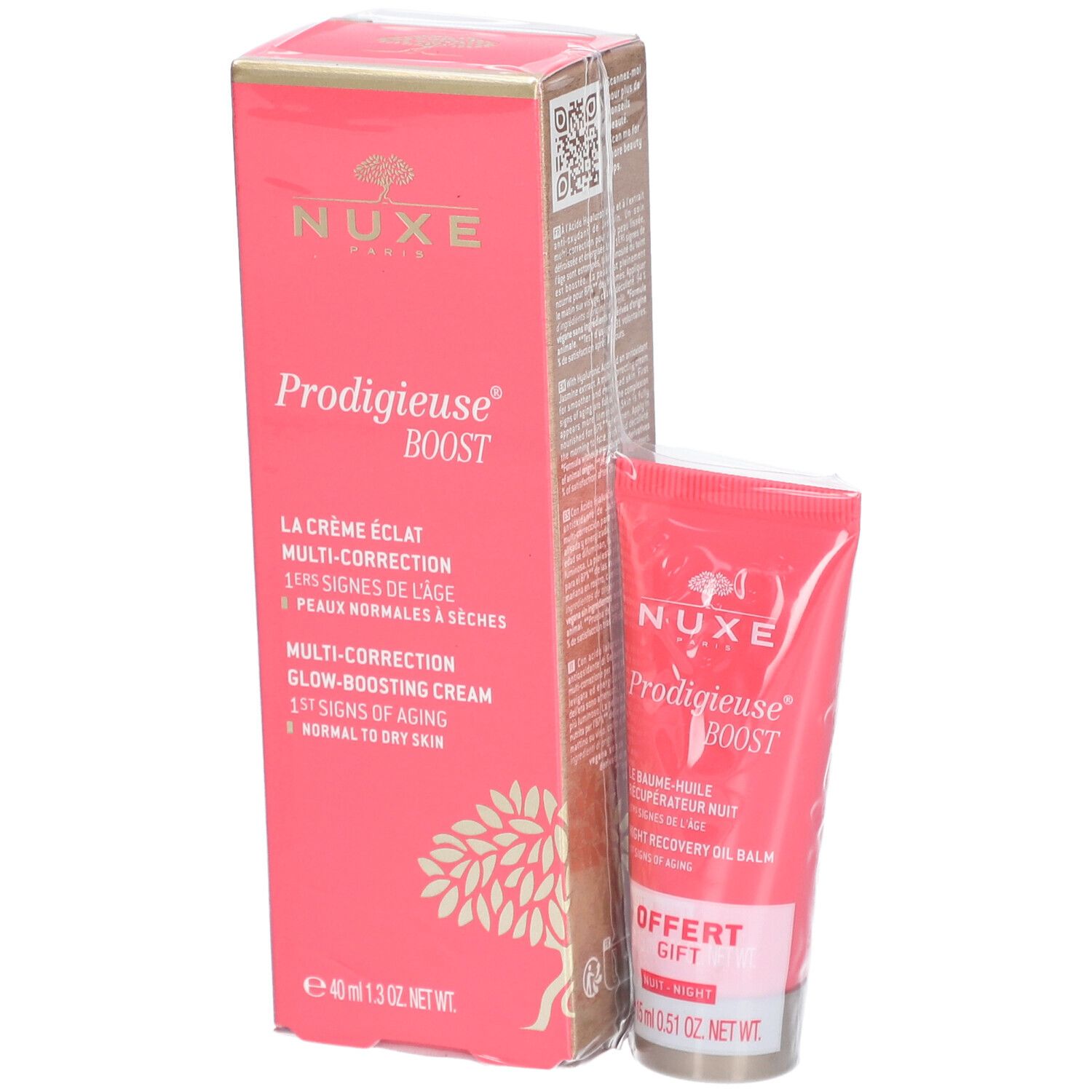 Boîte et tube roses. Inscription: Nuxe Prodigieuse Boost. Contient crème et baume de nuit. Cadeau gratuit.