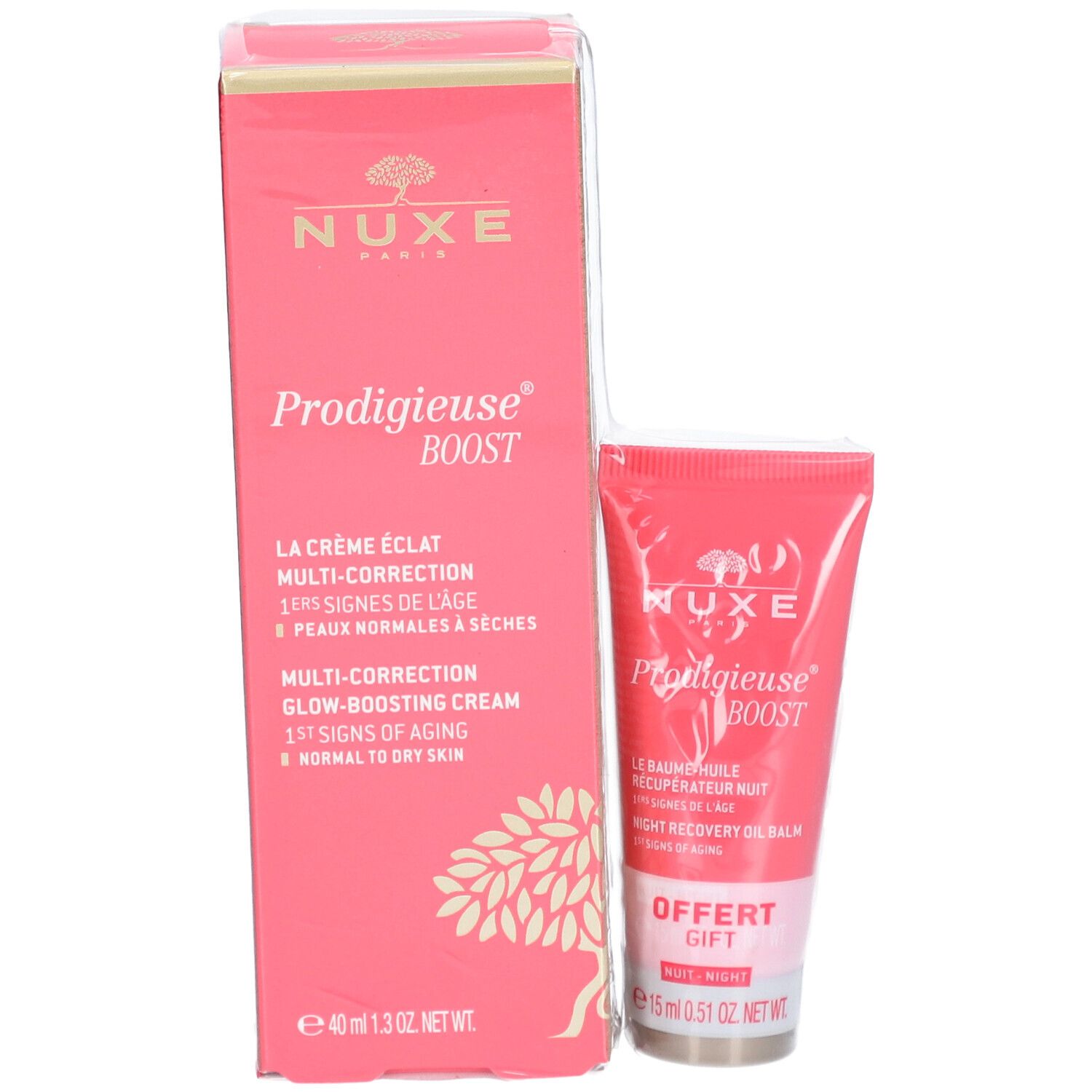 Boîte et tube roses. Inscription: Nuxe Prodigieuse Boost. Contient crème et baume de nuit. Cadeau gratuit. 15 ml.